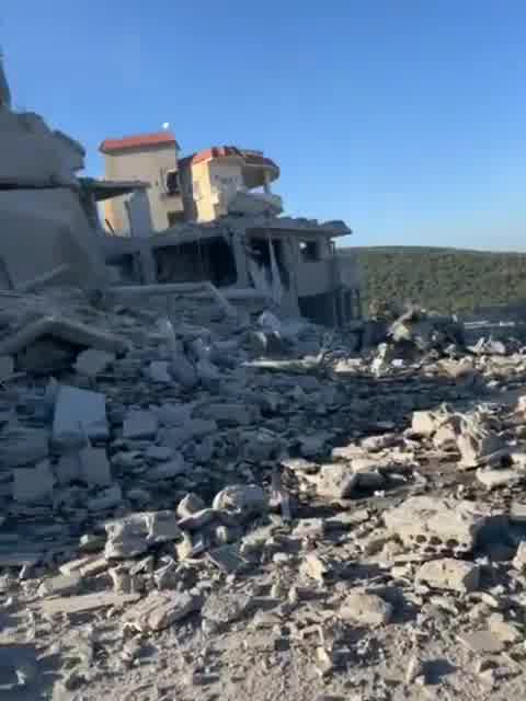 Aftermath of Israeli airstrikes on a residential building in the village of Deir Aames, southern Lebanon.