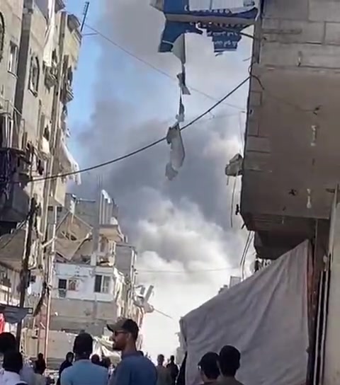 Israeli bombing of Al-Bureij camp in central Gaza Strip.