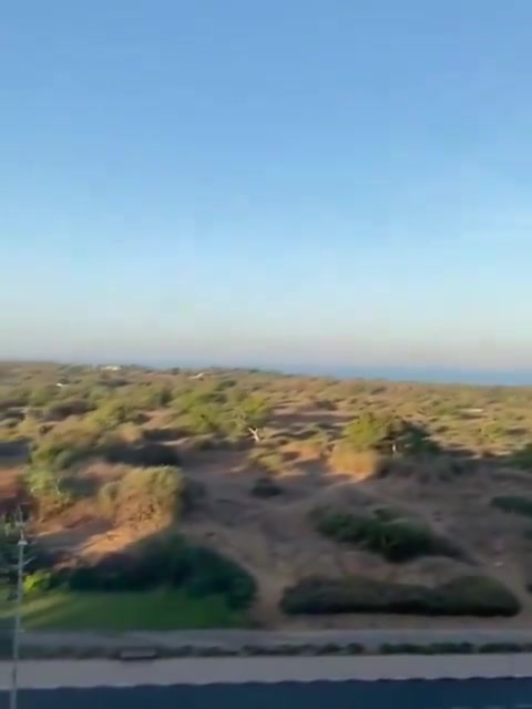 An explosive-laden drone impacted an open area in Ashkelon a short while ago, the Israeli army says and footage shows. The military does not yet detail where the drone was launched from. There are no reports of injuries