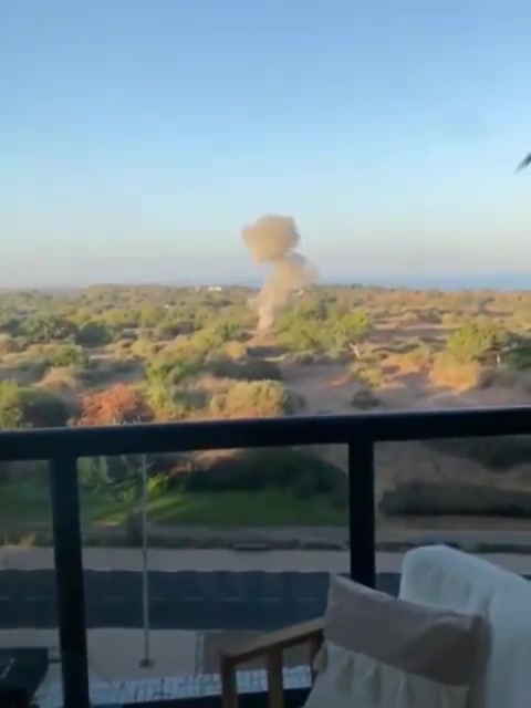 An explosive-laden drone impacted an open area in Ashkelon a short while ago, the Israeli army says and footage shows. The military does not yet detail where the drone was launched from. There are no reports of injuries