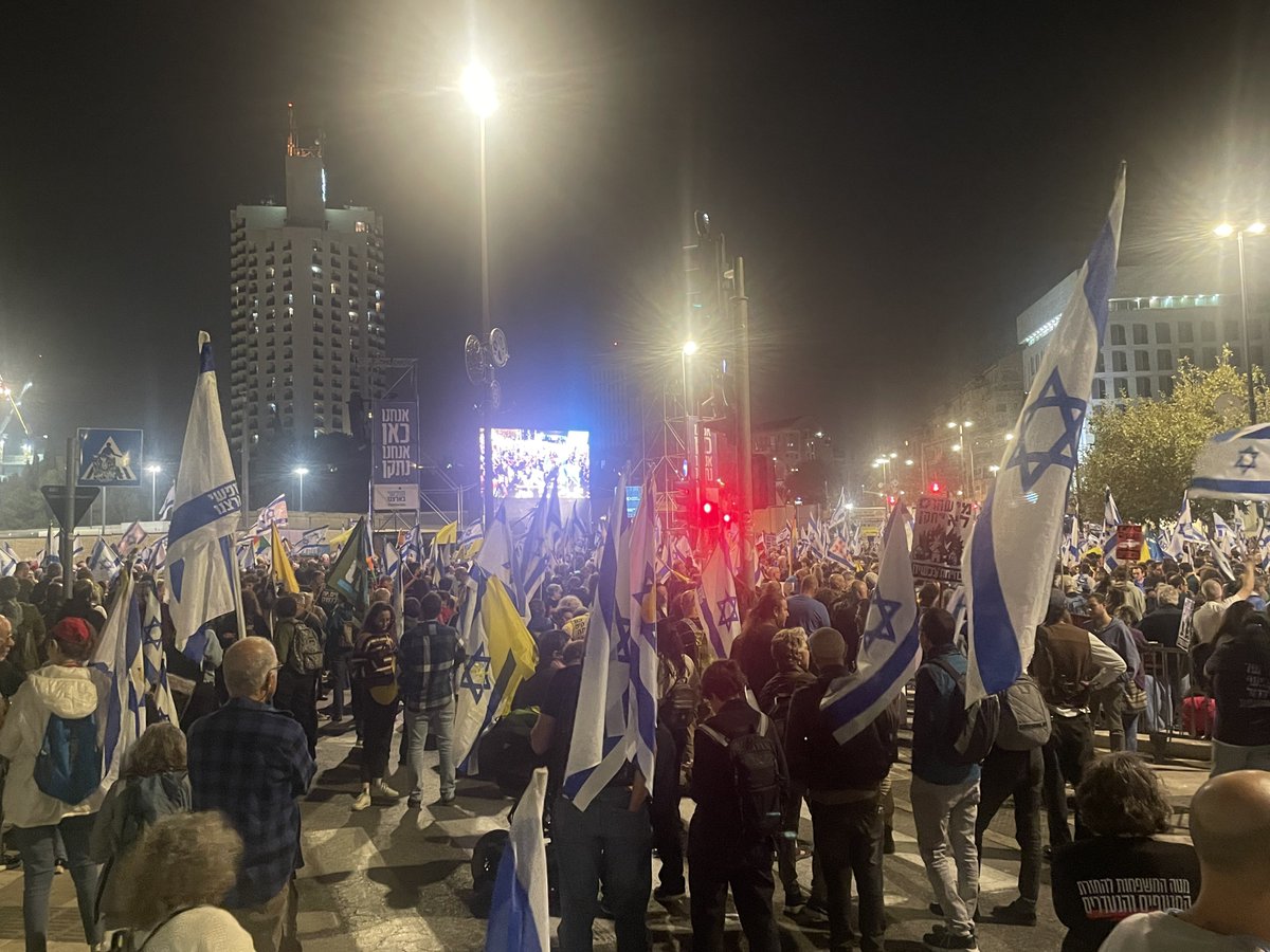 At a protest down the street from the Knesset a speaker declares that during a Mitzva war everyone goes out to fight. “If this isn’t a Mitzva war what is,” he asks.