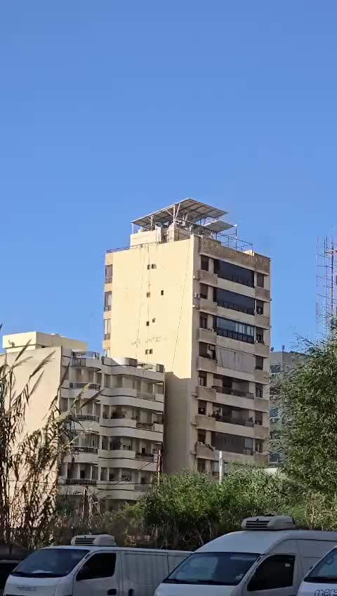 Een gebouw in Ain al-Rummaneh - Shiyah was het doelwit van een Israëlische inval