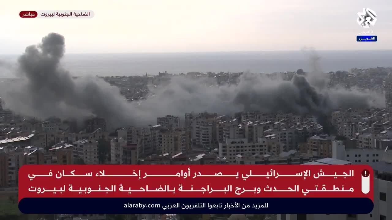 Israeli warplanes launch a raid on the southern suburb of Beirut