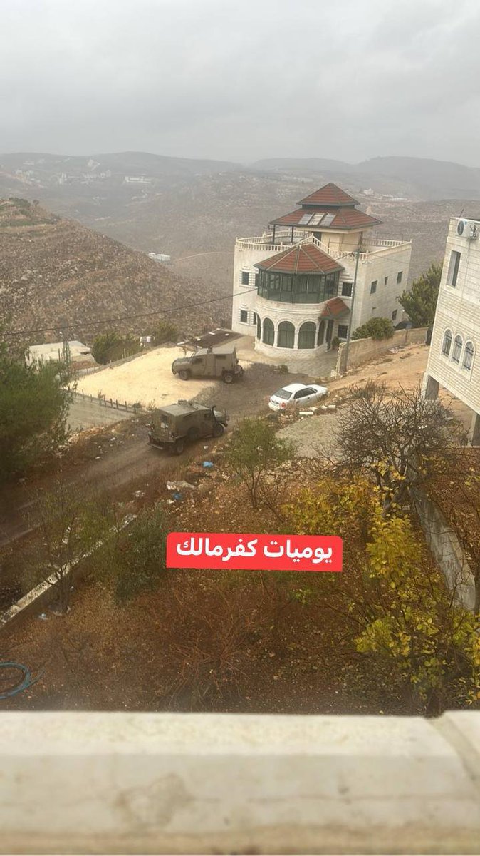 Israeli security forces confiscate a vehicle during their raid on the village of Kafr Malik, northeast of Ramallah