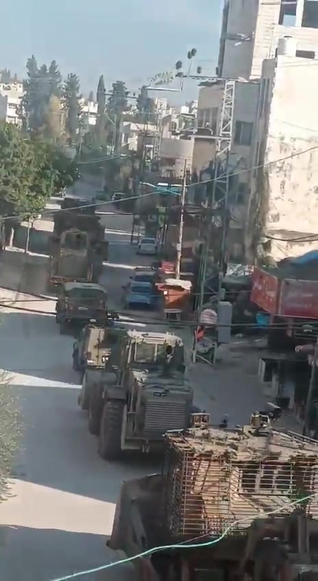 Palestinian media report clashes between Israeli forces and local militants in the West Bank's Tulkarm, amid circulating footage of robust deployment of Israeli army troops in the area. Reports of Israeli forces besieging the Tulkarm camp and heavy machinery demolishing infrastructure