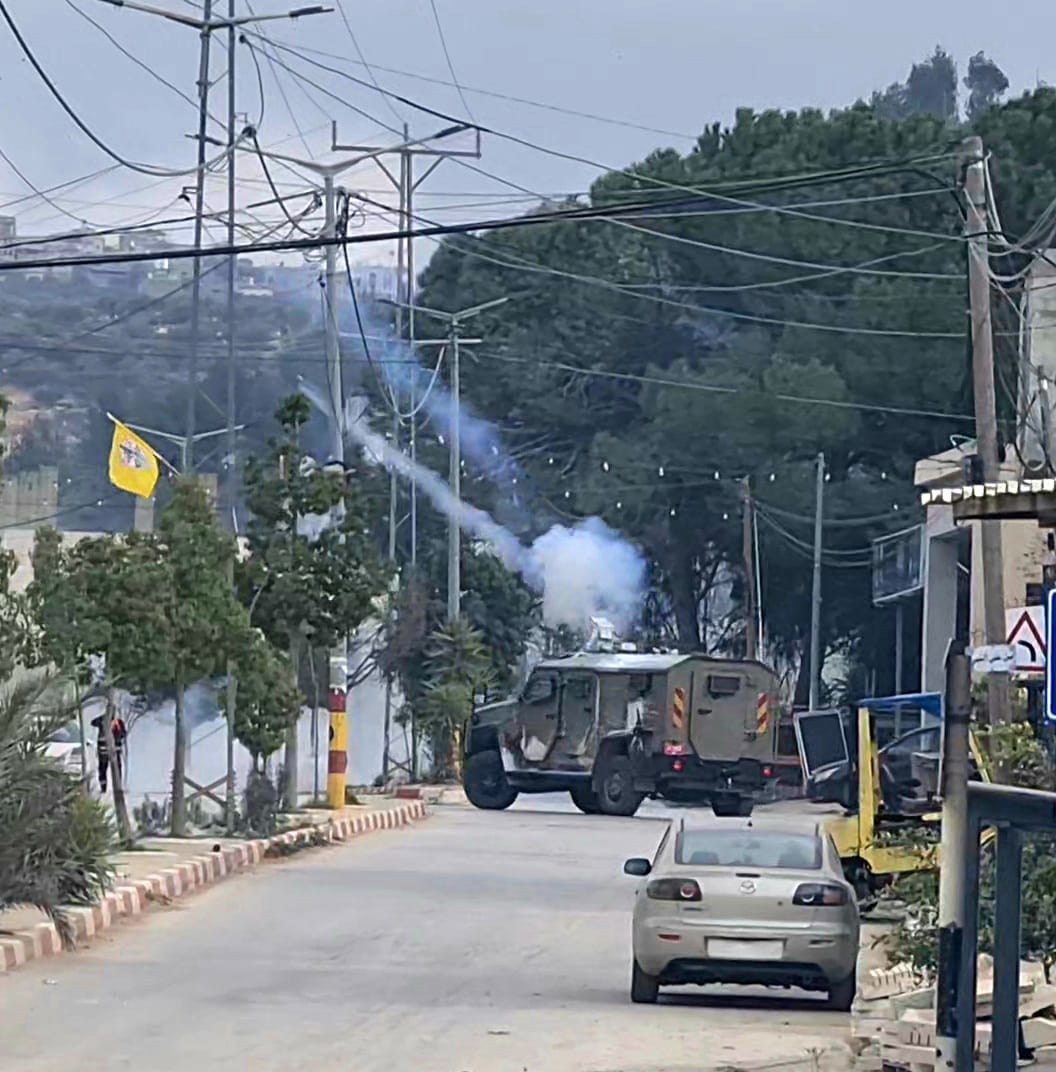 Israeli security forces fire tear gas canisters during raid on Beita town, south of Nablus