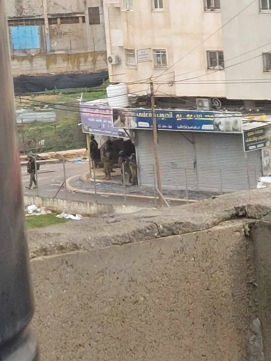 Israeli security forces open fire heavily near the entrance to Al-Fawar camp, east of Dura city, south of Hebron