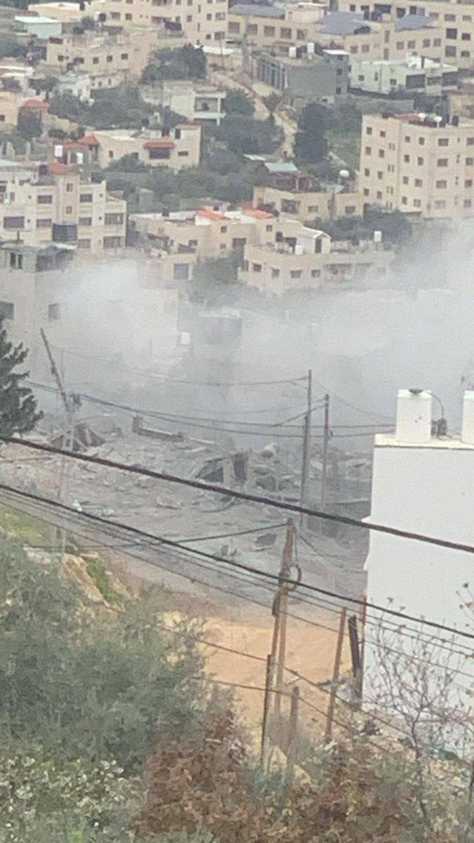 The house of the Nidal Al-Amer's family is blown up in Jenin camp