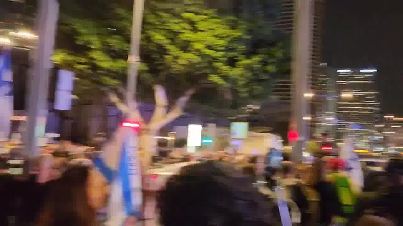 A march that left the Habima demonstration toward Ayalon was stopped on Begin Road by police and horsemen. Two protesters who were sitting on the road and refused to move were arrested. One of the horsemen whipped Haaretz photographer Itai Ron with the reins, in the footage wearing a white shirt and hat. Photo: Yair Palti