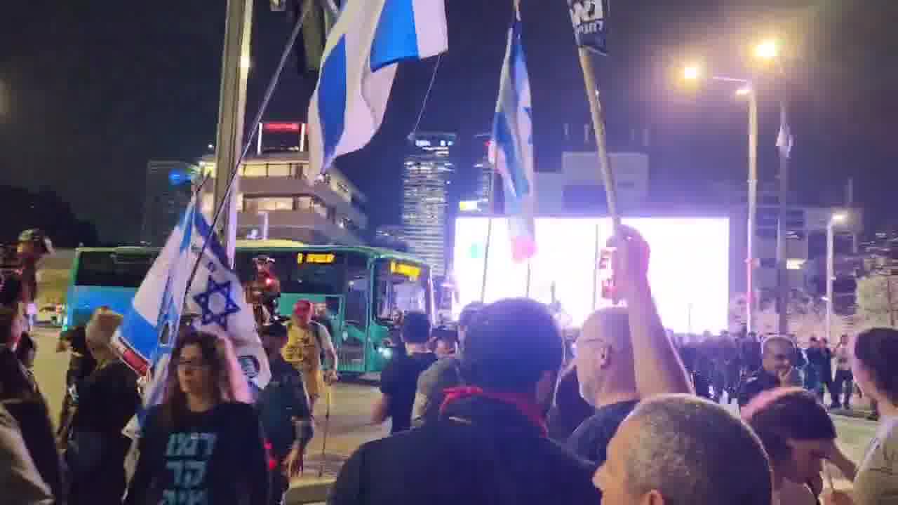 A march that left the Habima demonstration toward Ayalon was stopped on Begin Road by police and horsemen. Two protesters who were sitting on the road and refused to move were arrested. One of the horsemen whipped Haaretz photographer Itai Ron with the reins, in the footage wearing a white shirt and hat. Photo: Yair Palti