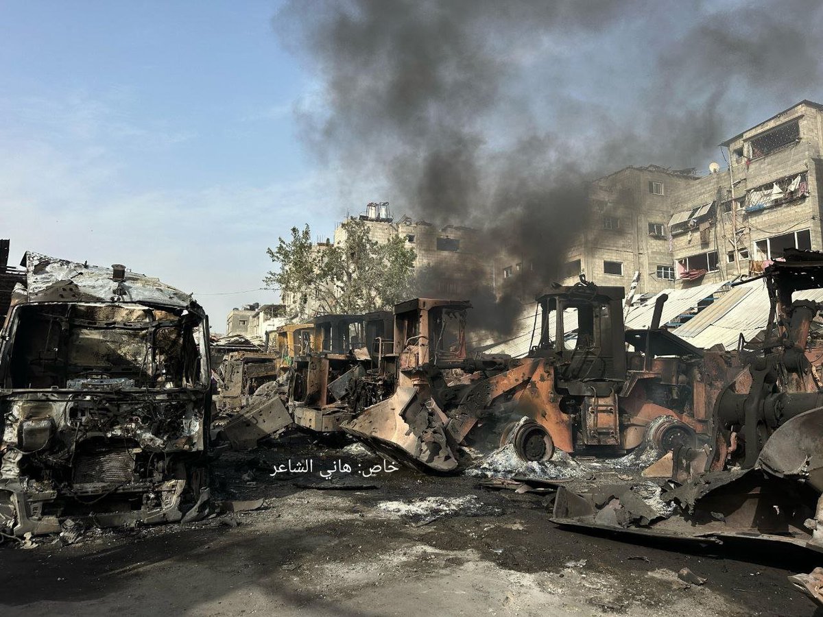 Bulldozers, equipment, and trucks were targeted and burned in airstrikes this morning in the Jabalia Al-Nazla Municipality garage, north of the Gaza Strip.