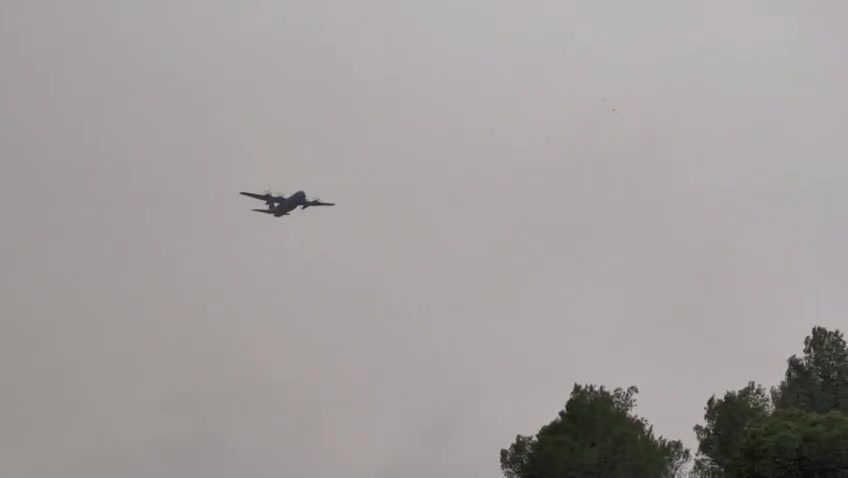 Documentation: A Samson plane drops fire retardant @ItayBlumental Photo: Jerusalem Air Force