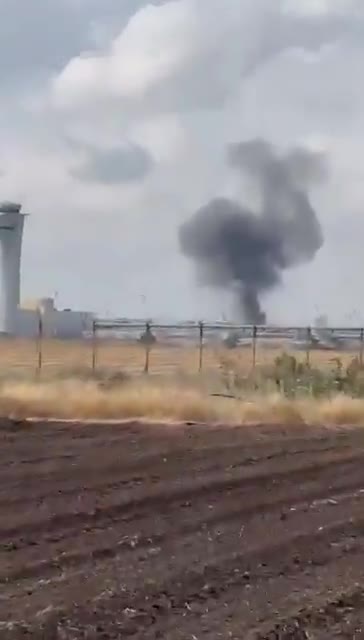 Smoke rises from near Ben Gurion International Airport in Tel-Aviv, after the ballistic missile fired by the Iranian-backed Houthis in Yemen, or shrapnel from the missile, impacted in Central Israel