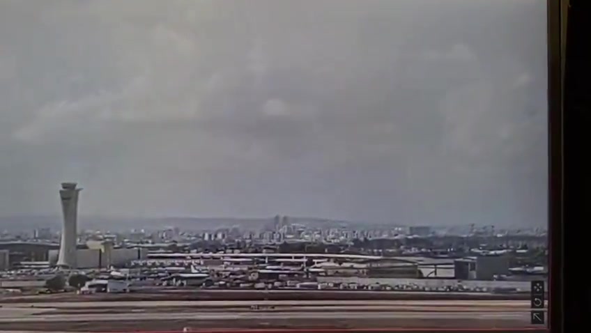 The moment a ballistic missile launched by Yemeni Houthis hit an area very close to Israel's Ben Gurion airport this morning