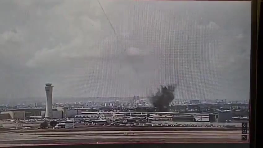 The moment a ballistic missile launched by Yemeni Houthis hit an area very close to Israel's Ben Gurion airport this morning