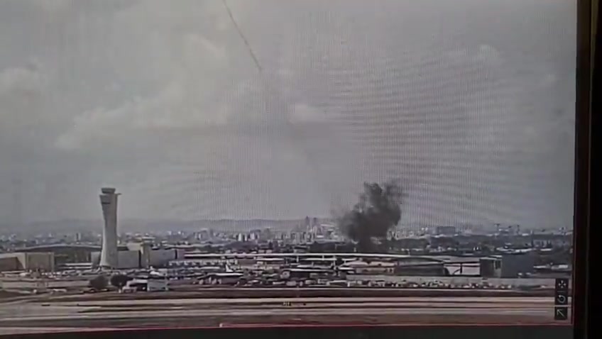 The moment a ballistic missile launched by Yemeni Houthis hit an area very close to Israel's Ben Gurion airport this morning