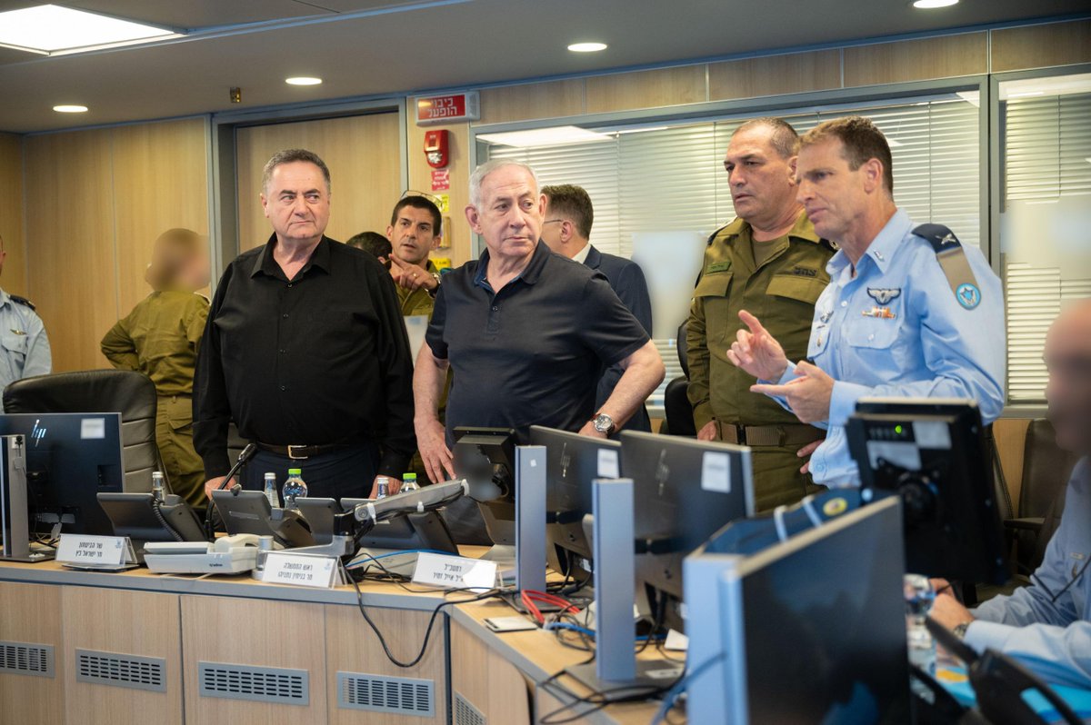 Prime Minister Benjamin Netanyahu, Defense Minister Israel Katz, and Israeli army Chief of Staff Lt. Gen. Eyal Zamir are huddled in the Israeli Air Force underground command center during the strikes on Houthi targets in Yemen.  Katz's office issues images