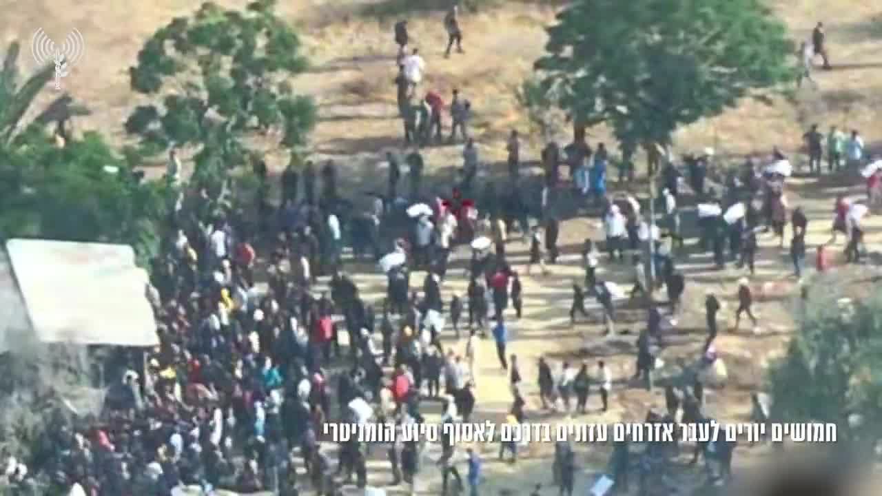 Israeli army drone footage: Gunmen in Gaza shoot at civilians trying to collect humanitarian aid