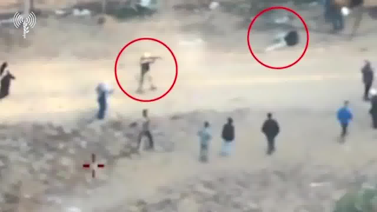 Israeli army drone footage: Gunmen in Gaza shoot at civilians trying to collect humanitarian aid
