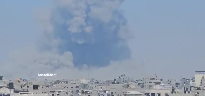 Thick smoke rises after an airstrike on the vicinity of Al-Rafei School in Jabalia al-Balad, north of the Gaza Strip, this afternoon.