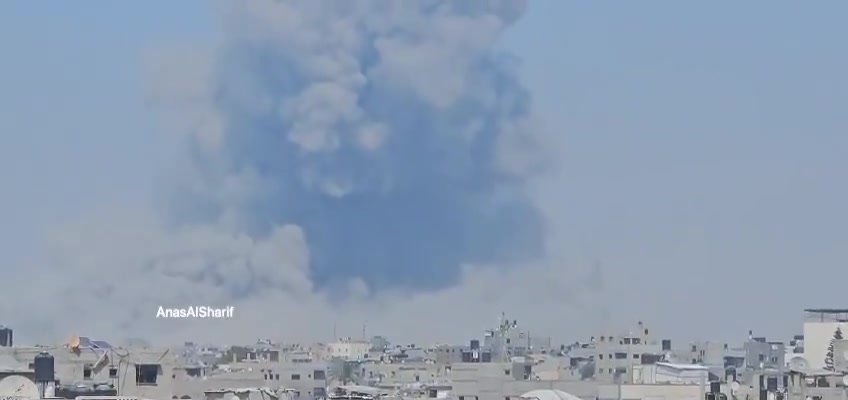 Thick smoke rises after an airstrike on the vicinity of Al-Rafei School in Jabalia al-Balad, north of the Gaza Strip, this afternoon.