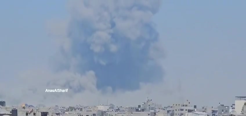 Thick smoke rises after an airstrike on the vicinity of Al-Rafei School in Jabalia al-Balad, north of the Gaza Strip, this afternoon.