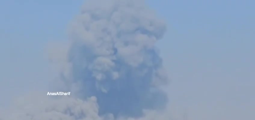 Thick smoke rises after an airstrike on the vicinity of Al-Rafei School in Jabalia al-Balad, north of the Gaza Strip, this afternoon.