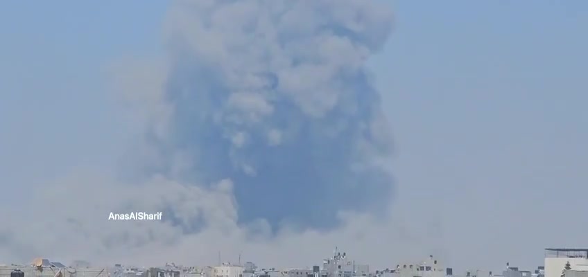Thick smoke rises after an airstrike on the vicinity of Al-Rafei School in Jabalia al-Balad, north of the Gaza Strip, this afternoon.