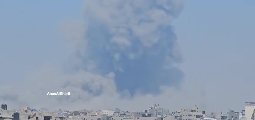 Thick smoke rises after an airstrike on the vicinity of Al-Rafei School in Jabalia al-Balad, north of the Gaza Strip, this afternoon.