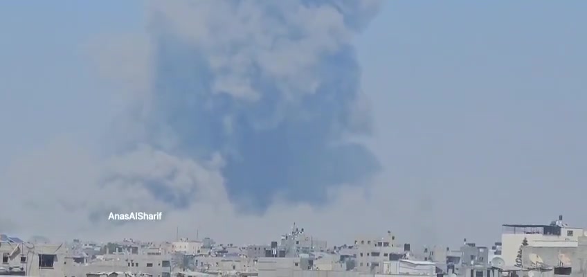 Thick smoke rises after an airstrike on the vicinity of Al-Rafei School in Jabalia al-Balad, north of the Gaza Strip, this afternoon.