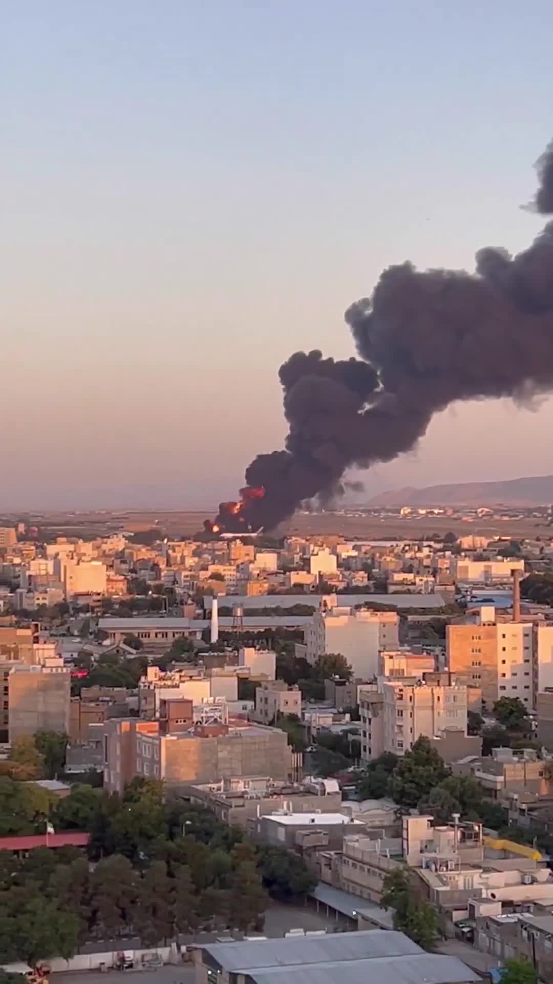 A large fire seen at Mashhad International Airport this afternoon in northeast Iran, after an alleged Israeli airstrike
