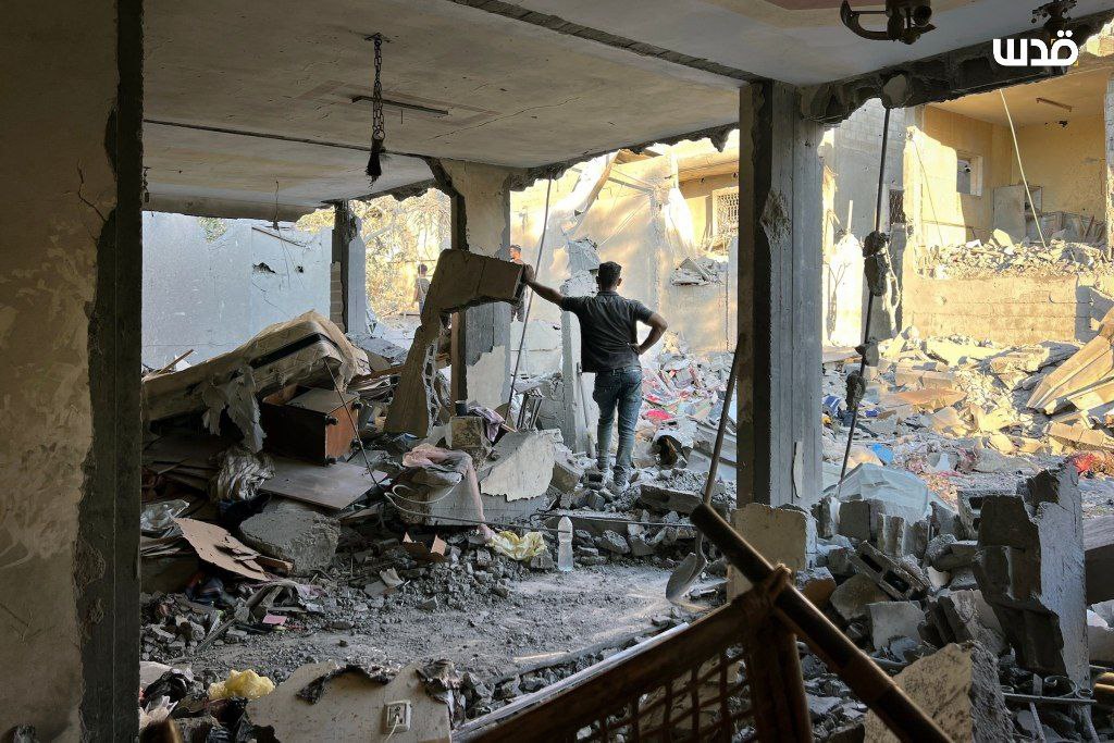The aftermath of an airstrike that targeted several homes in the Nuseirat refugee camp in the central Gaza Strip.