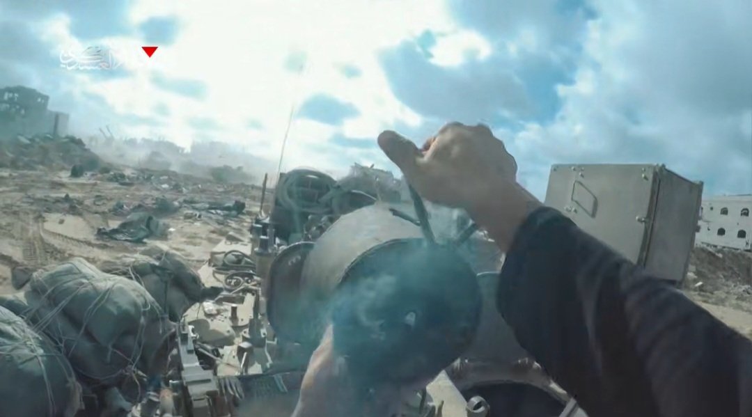 Hamas published footage of the attack on an Israeli army APC that resulted in the deaths of 7 Israeli troops.  One of the attackers, dressed as a woman, dropped a charge into an open hatch on top of the APC causing an explosion