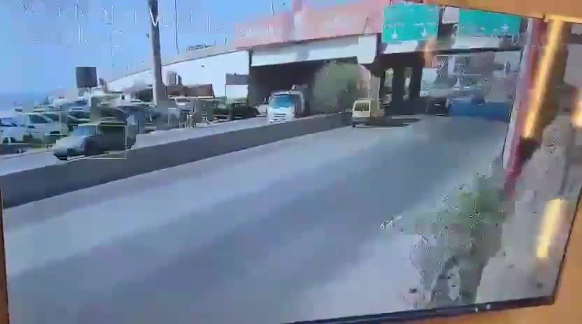 A surveillance camera documents the moment an Israeli drone launched a raid on a car in Khaldeh.