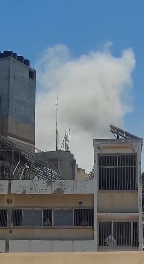 Airstrikes on the Akila building behind the Baptist Hospital in central Gaza City