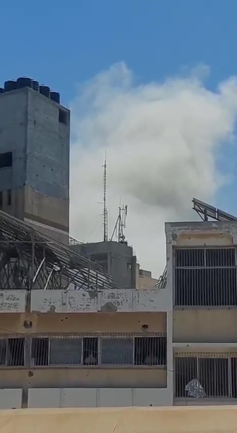 Airstrikes on the Akila building behind the Baptist Hospital in central Gaza City