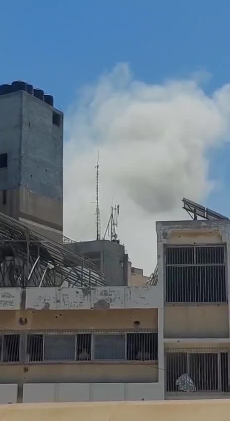 Airstrikes on the Akila building behind the Baptist Hospital in central Gaza City