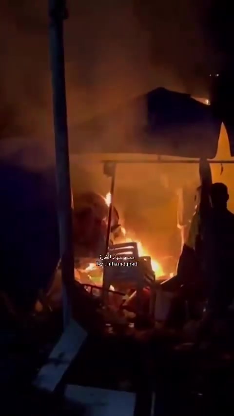 Fire breaks out in the tents of displaced people after they were bombed near Al-Ard Al-Tayyiba in Mawasi, Khan Yunis.