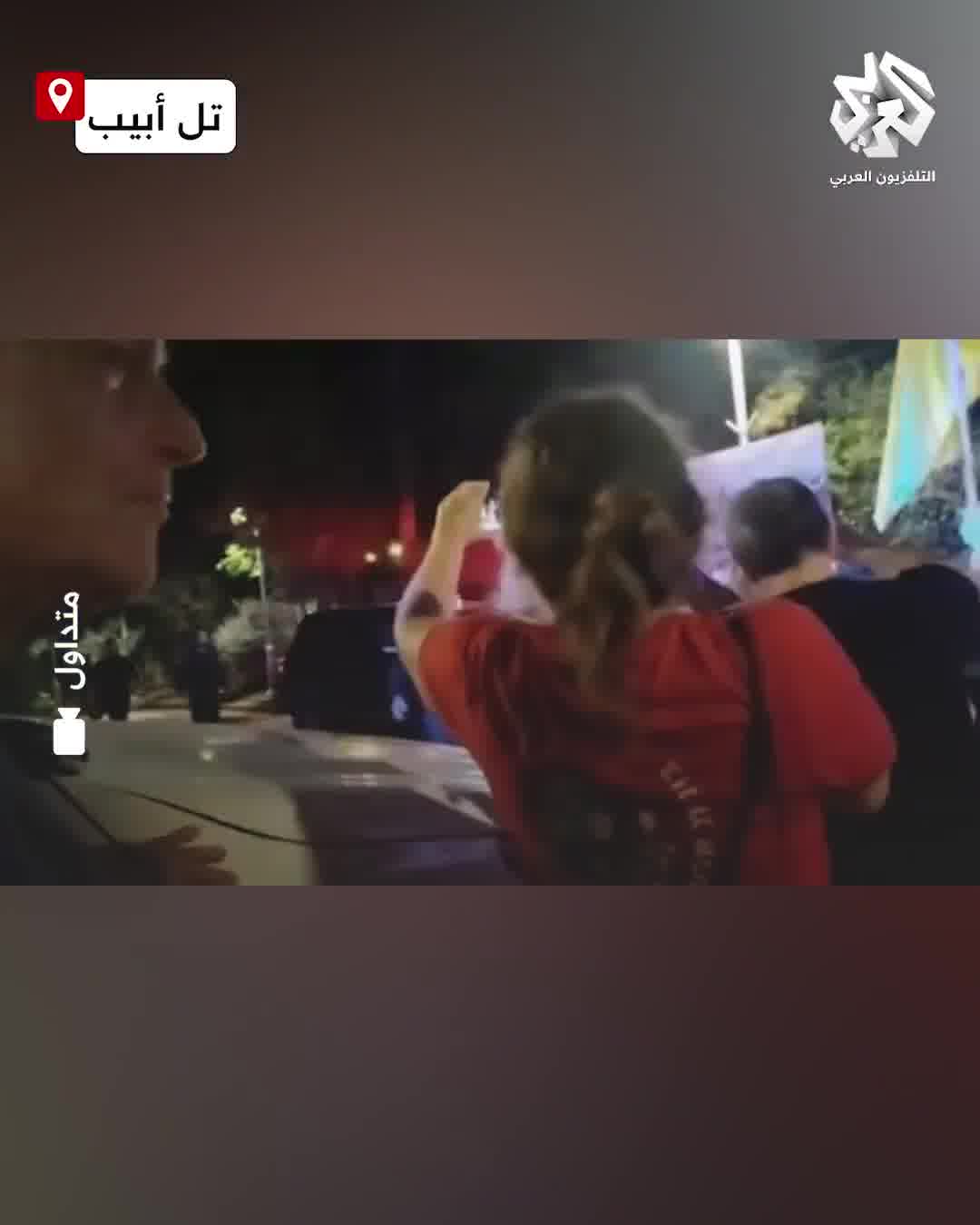Protesters attempt to block Itamar Ben-Gvir's car as he leaves Kibbutz Kafr Malal, north of Tel Aviv.