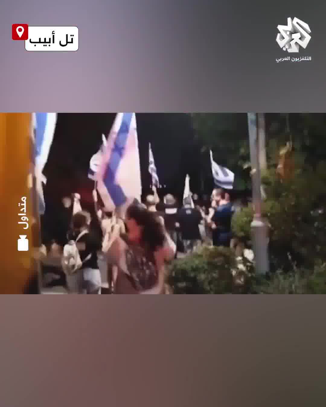 Protesters attempt to block Itamar Ben-Gvir's car as he leaves Kibbutz Kafr Malal, north of Tel Aviv.