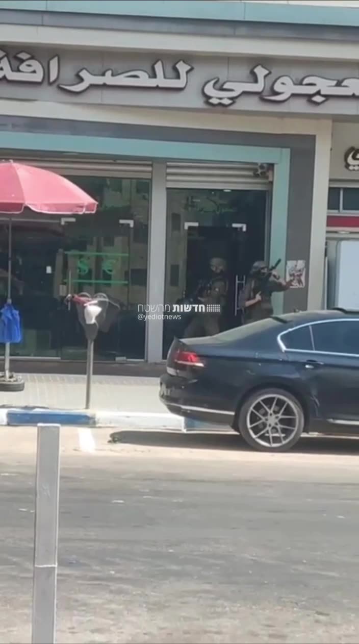 Israeli army forces raid a building in Ramallah - clashes at the scene