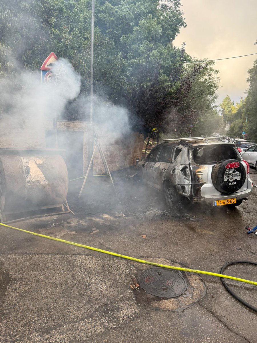 A car is burnt in the streets of Jerusalem near the PM's residence during protests for release of hostages.My husband is going back to the reserves in Gaza next week and I have a burned-out vehicle,” says car owner Tamar Bar Shai. Photo: Police Spokesperson's Unit