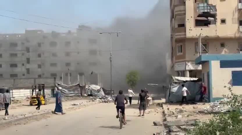 An airstrike targeting the Malkan building on Al-Nafaq Street, east of Gaza City.