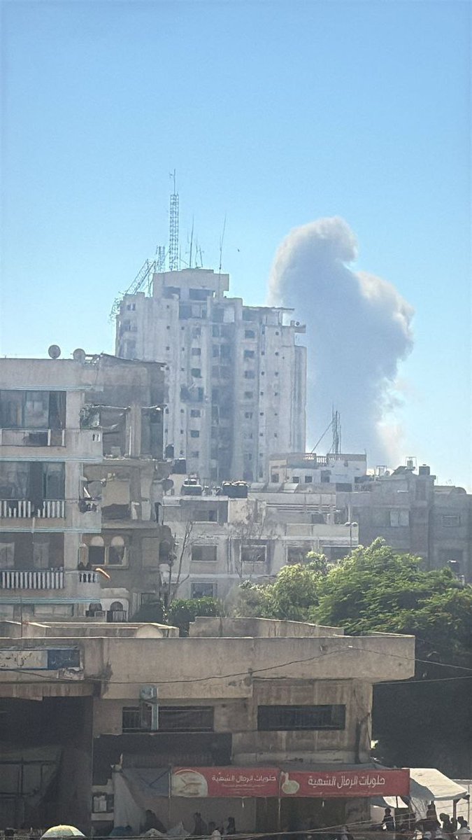 Columns of smoke rise following a series of violent airstrikes targeting the Tal al-Hawa neighborhood, west of Gaza City.