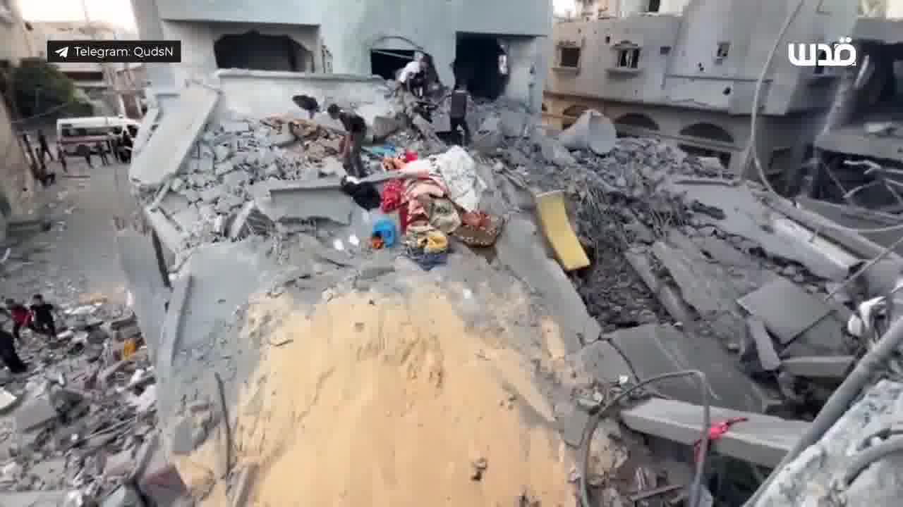 The aftermath of an airstrike that targeted the Abu Dahrouj family home in the Nuseirat camp in the central Gaza Strip at dawn today, resulting in a massacre of displaced people.