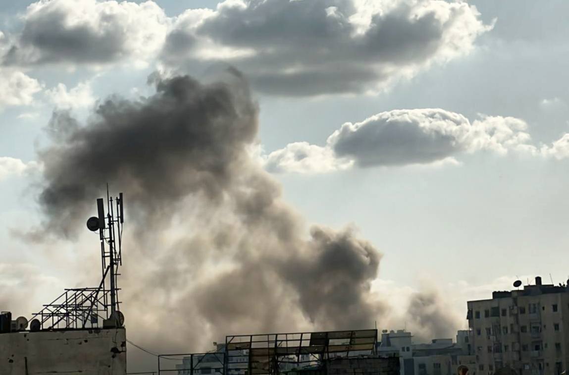 Airstrikes hit the Tel al-Hawa neighborhood in Gaza City.