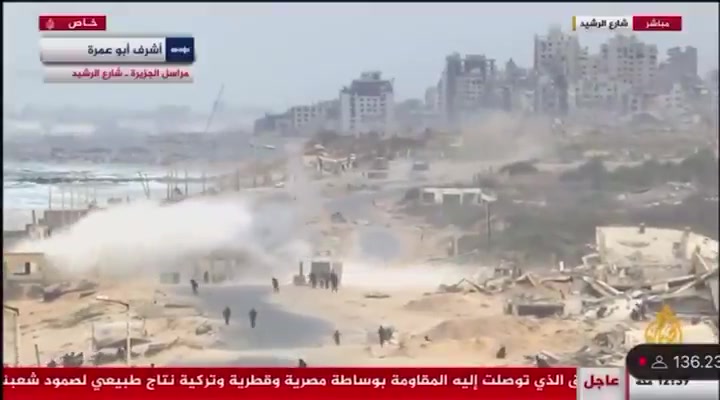 Palestinian media reports that the Israeli army deployed tanks to the Rashid coastal road to prevent Palestinians from returning to Gaza City and the Strip's north. Footage shows the tanks firing shells near a crowd of Palestinians gathering in the area
