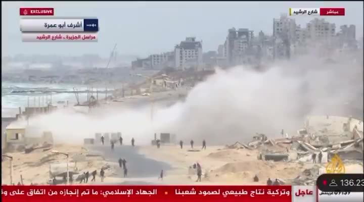 Palestinian media reports that the Israeli army deployed tanks to the Rashid coastal road to prevent Palestinians from returning to Gaza City and the Strip's north. Footage shows the tanks firing shells near a crowd of Palestinians gathering in the area