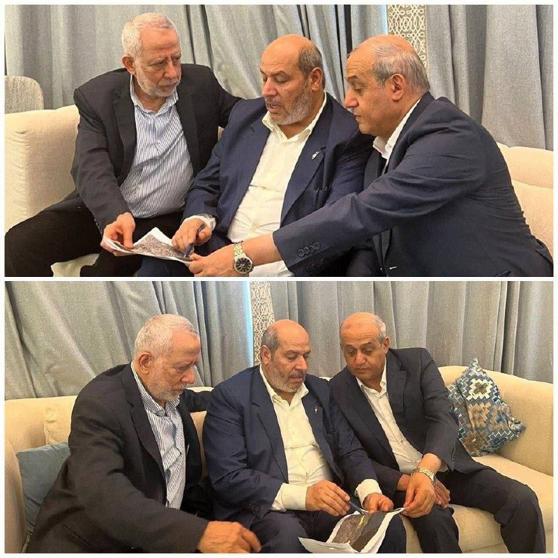 Hamas's head of negotiations Khalil al-Hayya (who survived the assassination attempt), Islamic Jihad deputy leader Muhammad al-Hindi (left) and Popular Front deputy leader Jamil Mizhar, look at the maps of the withdrawal of Israeli army forces.