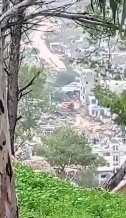 Bulldozers begin demolishing citizens' homes in the Al-Manshiya neighborhood of Nur Shams camp, east of Tulkarm city.